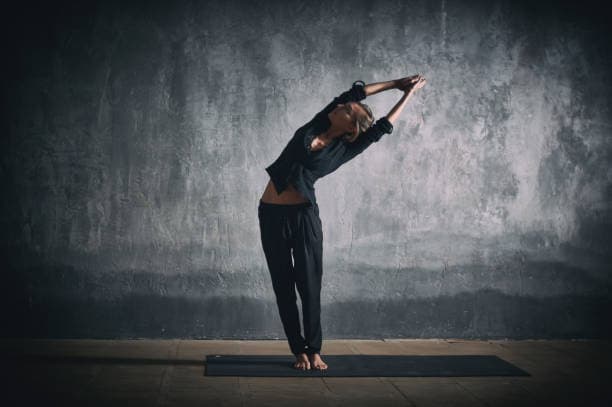 Tiryaka Tadasana (Swaying Palm Tree Pose)